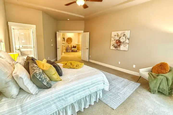 Looking towards double door entrance to primary.  Private bath is off to the left.