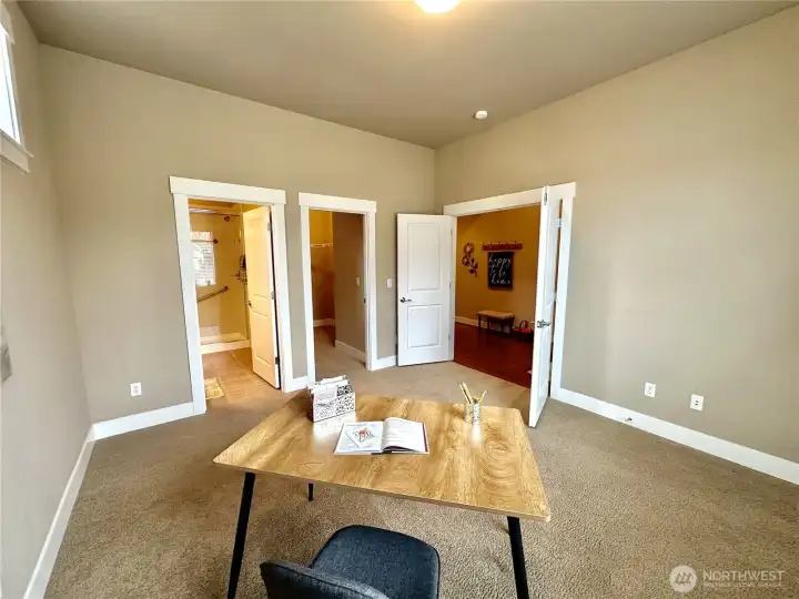 Another view of bedroom #2 shows access to walk-in closet and .75 bath.