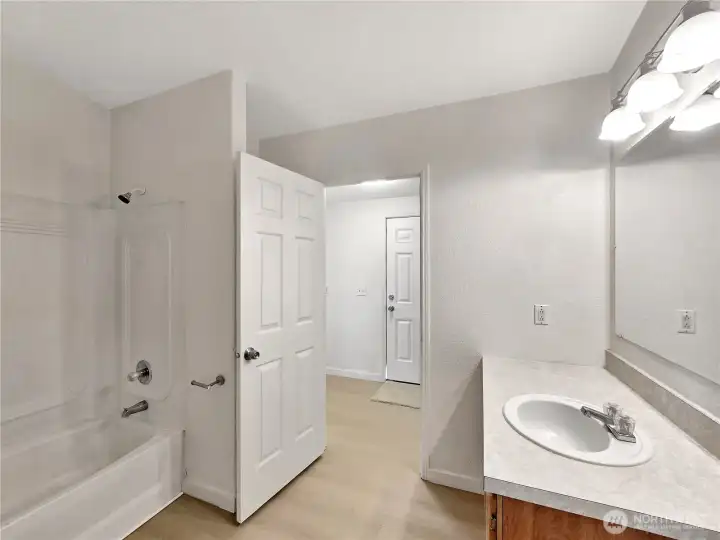 Easy access to the main bath from the laundry room.