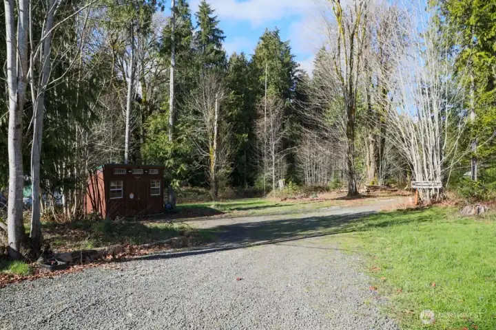 This is the well house. Beyond the well house is a circle, with 3 campsites. The campsites will need some refreshing by clearing out bushes again, but the basic groundwork has been done. No RV hookups here, but they make great tent sites with a water spiget nearby.