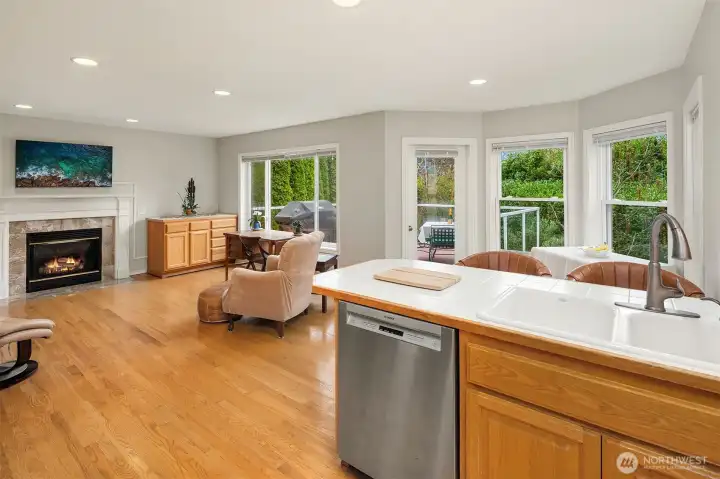 family room and kitchen with territorial views of the backyard