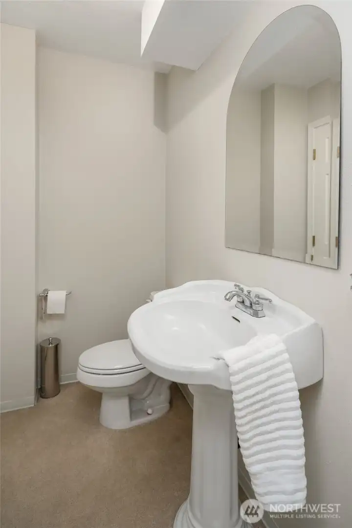 half bathroom next to the rec room on the lower floor