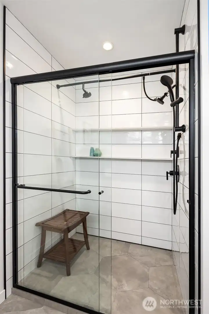 Walk-in shower adds luxury to the primary bathroom.