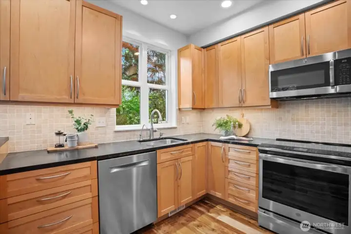 Updated kitchen with KitchenCraft cabinets and soapstone counters