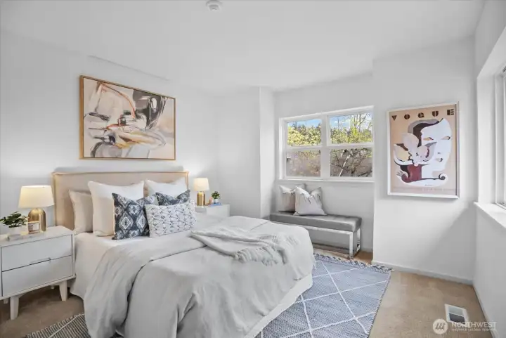 Bedroom 2 is spacious with windows from two directions.