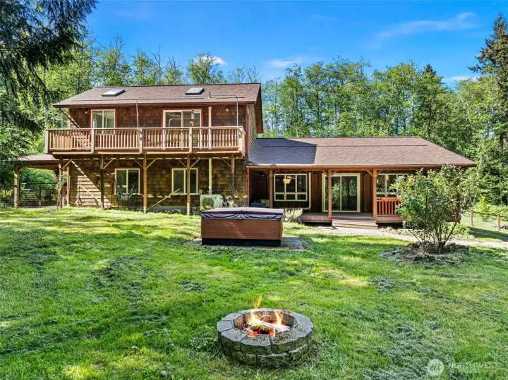 Fully-fenced backyard is private, spaceous and provides easy access to your covered porch and kitchen area insdoors for BBQs and entertaining.
