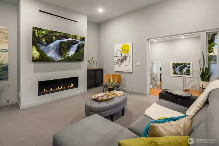 Multi-use space on upper level. Currently set-up as a lounge but can be a bedroom with ample custom closets.