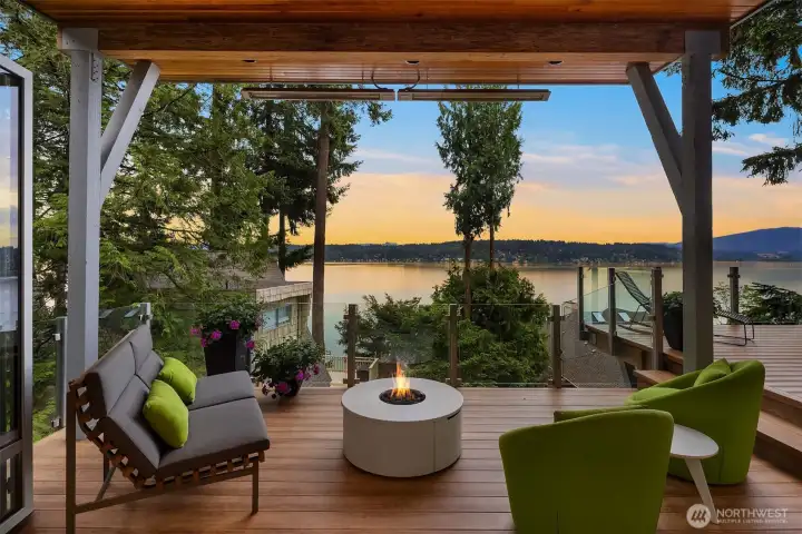 Covered deck with built-in heaters for all-weather enjoyment.