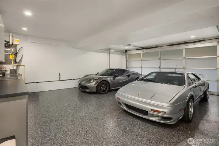 Pristine 2-car garage with built-in storage