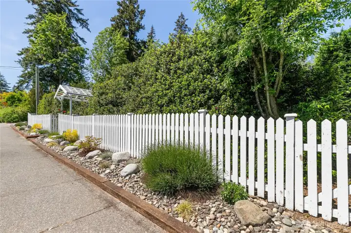drought hardy landscaping and picket fence