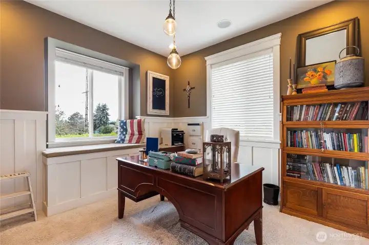 Den off the entry with natural lighting and windo seat