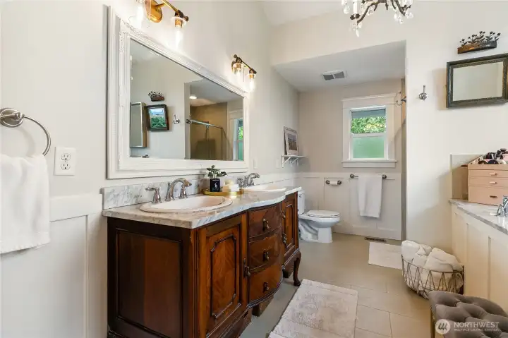 Primary Bathroom with custom vintage vanity and Marble counter