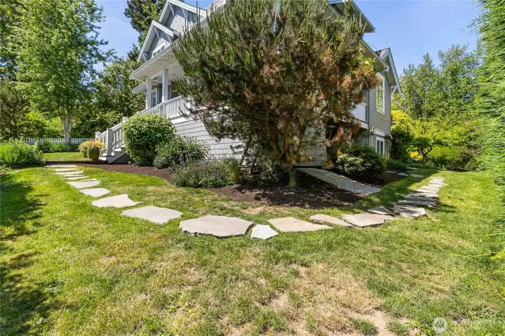 Side yard view with stone bath to basement suite