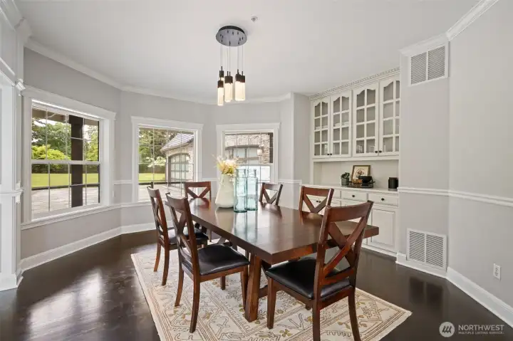 formal dining room with amazing light and built-ins. formal dining room with amazing light and built-ins.