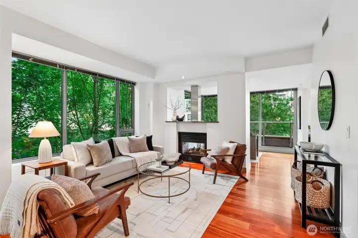 Open Concept Living Room with Two Sided Gas Fireplace