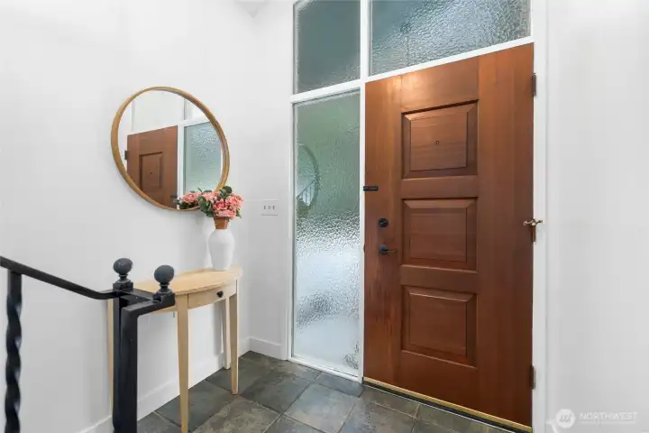 Split-Entry featuring tile floors and massive frosted windows for privacy