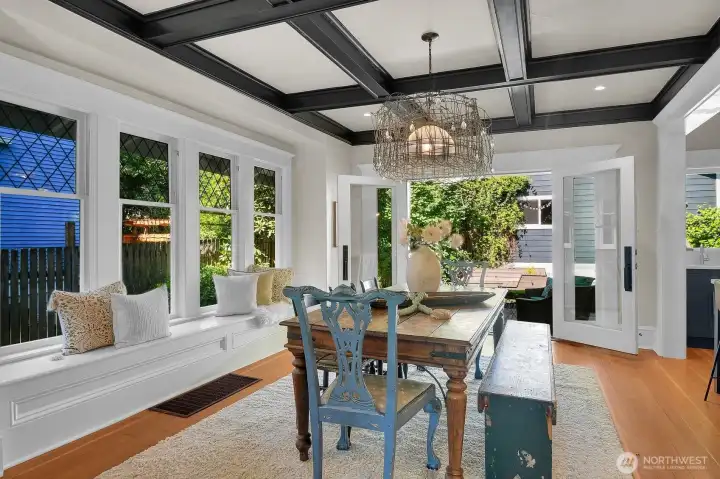 A built-in dining bench and French doors link entertainment spaces perfectly here. A built-in dining bench and French doors link entertainment spaces perfectly here.