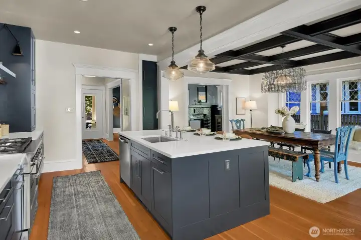That island holds a dishwasher and sink and is full of storage on both sides! That island holds a dishwasher and sink and is full of storage on both sides!
