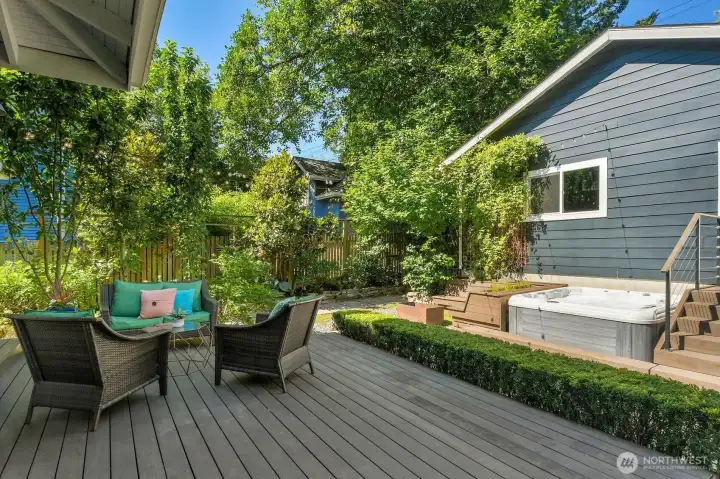 A hot tub beckons just beyond the deck. A hot tub beckons just beyond the deck.