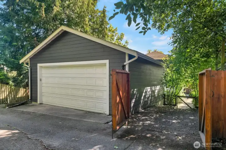 2 car garage off of the alley, PLUS an additional parking spot (or chicken coop!). 2 car garage off of the alley, PLUS an additional parking spot (or chicken coop!).