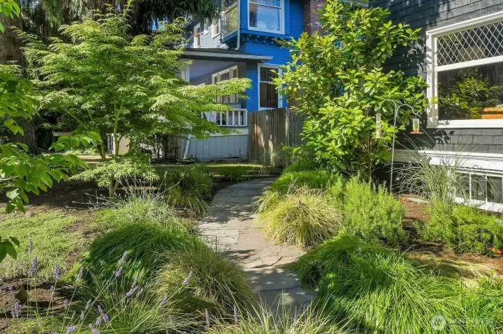 Bumblebees, hummingbirds, butterflies and songbirds adorn this low-maintenance garden space. Bumblebees, hummingbirds, butterflies and songbirds adorn this low-maintenance garden space.