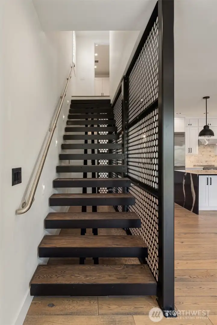 Floating Iron Staircase with Hardwood Treads. Floating Iron Staircase with Hardwood Treads.