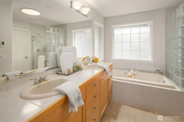 Primary bath with a large walk in closet.