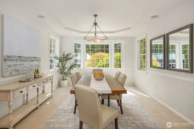 Formal dining room with a great view of the outdoors.