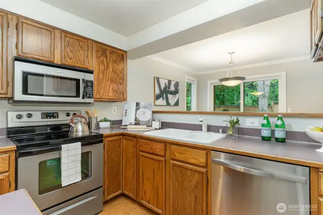 Kitchen features SS appliances