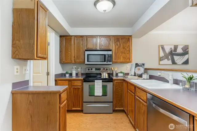 Super convenient kitchen features a breakfast bar