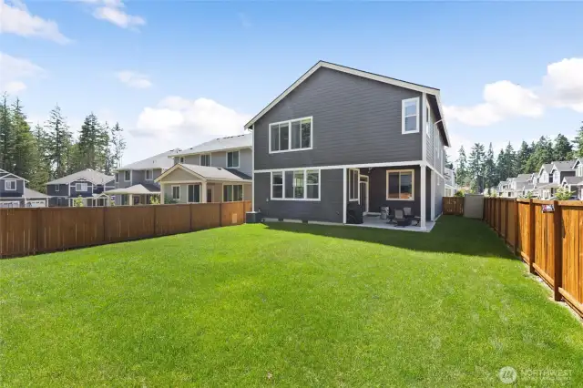 Large fenced in backyard