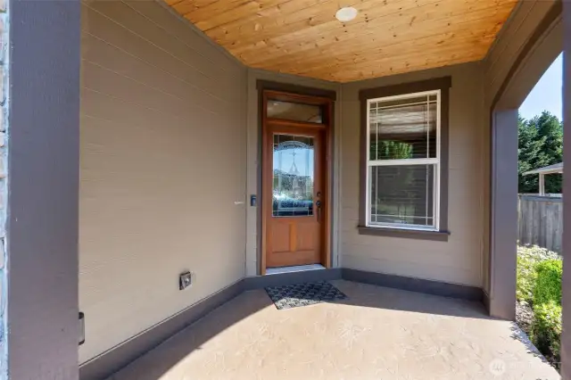 Covered front entry with space for seating