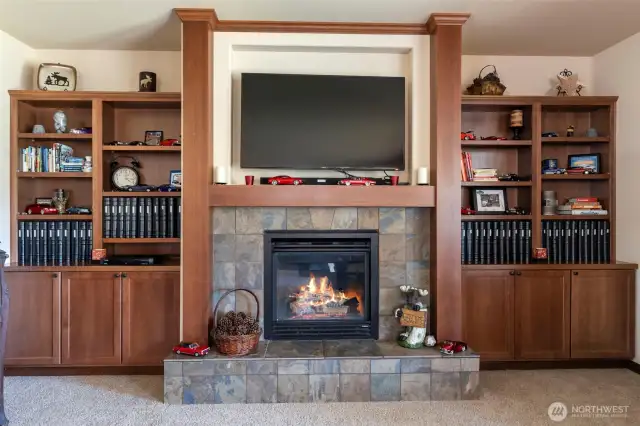 Upgraded built ins during construction around fireplace and tv