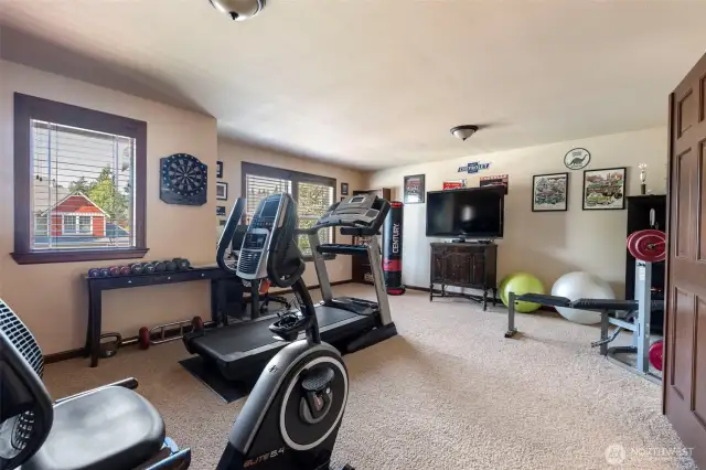 Bonus room upstairs, currently used as a fitness area and second office