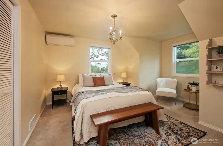This is the bedroom (Bedroom #3) that is at the top of the stairwell and in the northwest corner of your home. The window straight ahead is the one with your peek-a-boo views of the Sound and Cascades. Mini-split in this room and ...another cozy space here too!