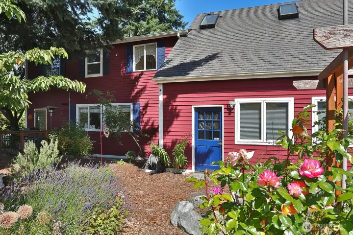 Blue door is to the garage/workshop space.