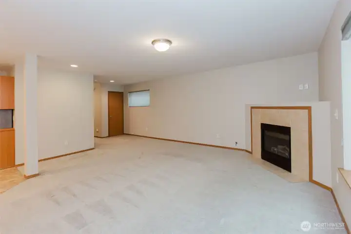 Alternate angle of the living room showcasing versatile layout.