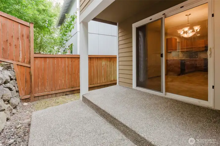 Sliding door to backyard patio.