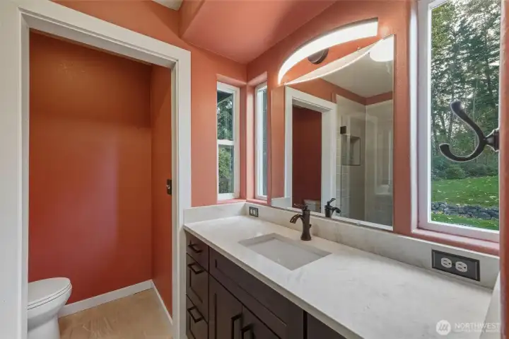 Views of private backyard from ensuite bath