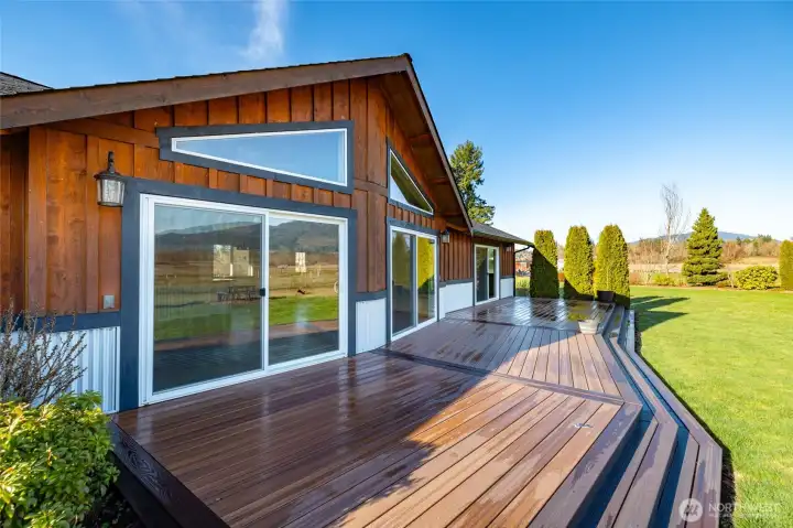 Wow a large deck across the back of the great room & primary bedroom.