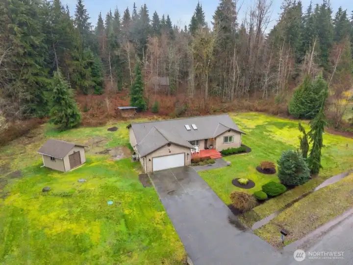 5 Acres w/additional outbuilding.