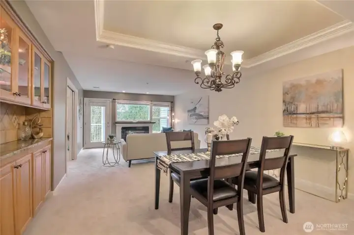 Open design with special features such as an elegant built-in display cabinetry, designer paint, and French pocket doors to your 2nd bedroom/den.