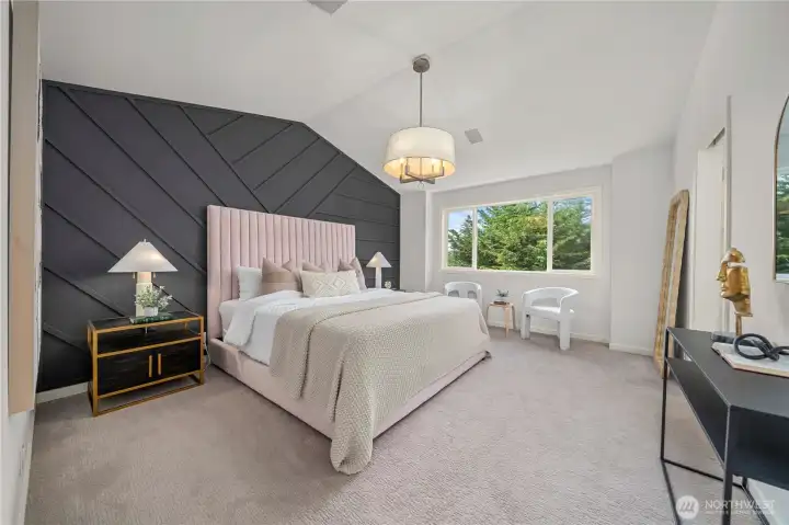 A serene and luxurious owner’s suite offers comfort, style, and the perfect place to unwind.