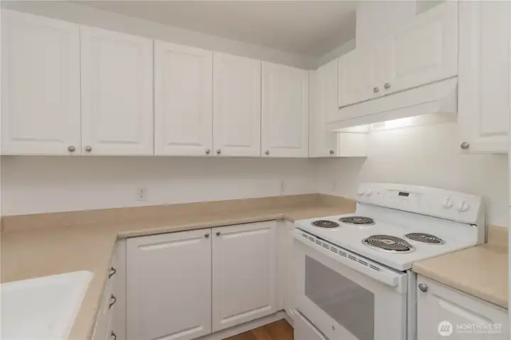 Efficient kitchen layout designed for easy meal preparation and flow.