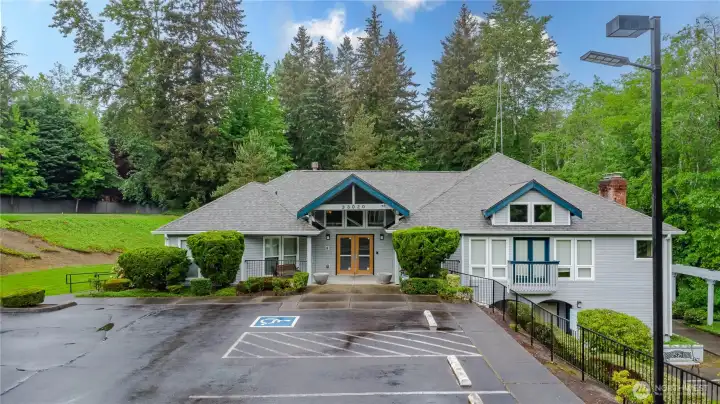 Well-appointed clubhouse featuring a pool, sauna, exercise room, and entertainment areas.