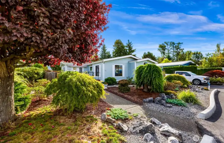 Welcome to 3802 James Street Estates, lot 23. Full of bright sunshine and surrounded by meticulous landscaping.