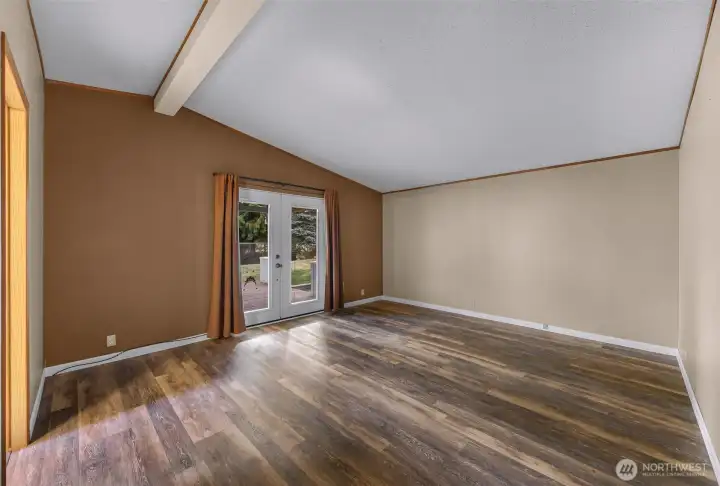 Large primary bedroom with vaulted ceilings