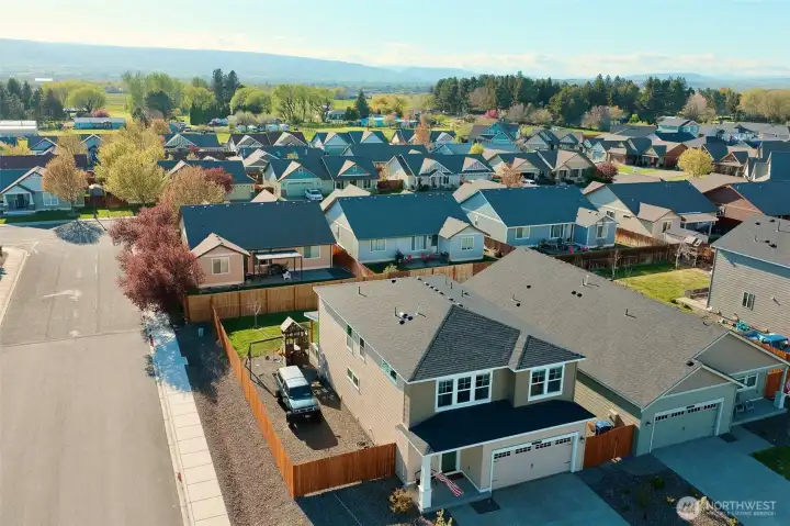 Extra parking tucked away in fenced side-yard