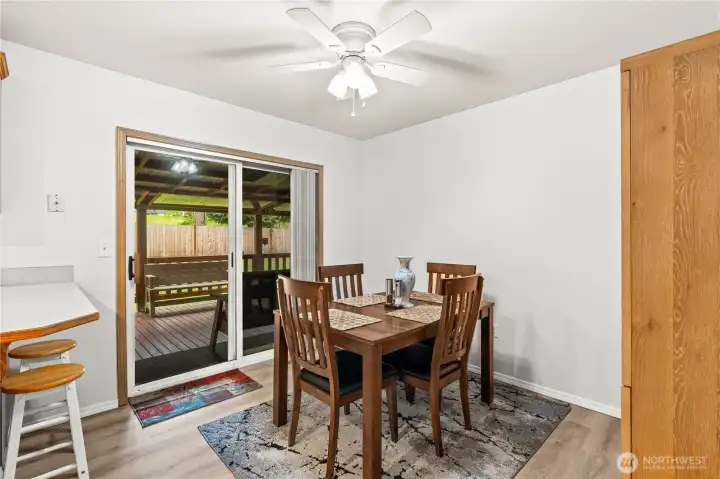 dining area looking towards covered and enclosed deck