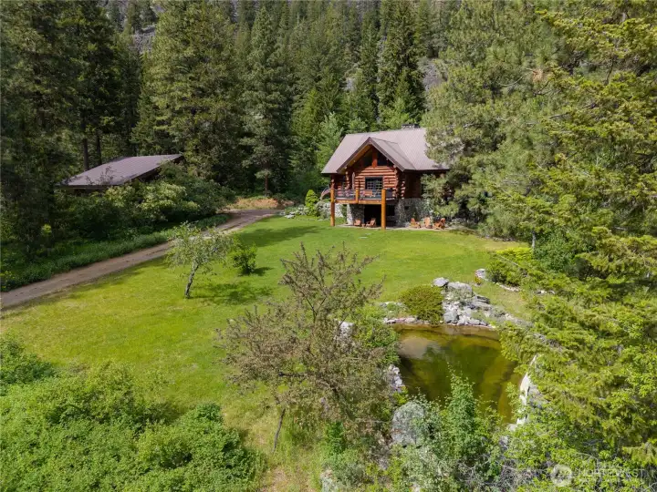 Perfect place for a picnic, out along the gravity-flow water cascading over natural rockwork into the swimming pond, creating a peaceful water feature.